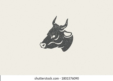 Black cow head silhouette with horns designed for meat industry hand drawn stamp effect vector illustration. Vintage grunge texture emblem for butchery packaging and menu design or label decoration.