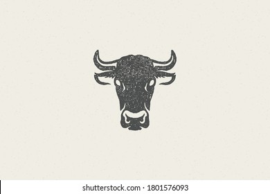 Black cow head silhouette with horns designed for meat industry hand drawn stamp effect vector illustration. Vintage grunge texture emblem for butchery packaging and menu design or label decoration.