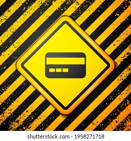 Black Credit card icon isolated on yellow background. Online payment. Cash withdrawal. Financial operations. Shopping sign. Warning sign. Vector