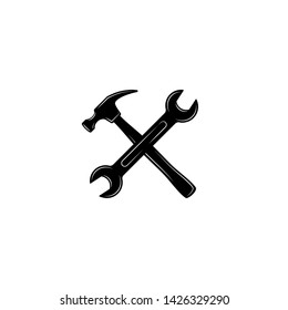 Black crossed carpenter hammer and spanner. Handyman, locksmith, joiner claw hammer tool and wrench  for repair and maintenance. Flat icon isolated on white. Vector illustration.