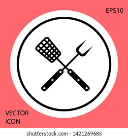 Black Crossed fork and spatula icon isolated on red background. BBQ fork and spatula sign. Barbecue and grill tools. White circle button. Vector Illustration