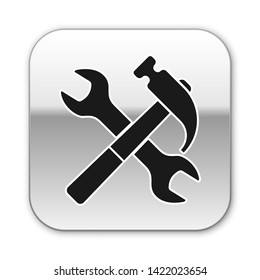 Black Crossed hammer and wrench icon isolated on white background. Hardware tools. Silver square button. Vector Illustration