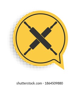Black Crossed rolling pins icon isolated on white background. Kitchen utensils and equipment. Yellow speech bubble symbol. Vector.