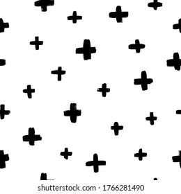 Black crosses vector seamless pattern. Hand drawn cross and plus sign. Black paint brush strokes geometrical pattern for wallpaper, web page background, textile design, graphic design.