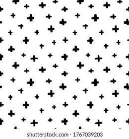 Black crosses vector seamless pattern. Hand drawn cross and plus sign. Black paint brush strokes geometrical pattern for wallpaper, web page background, textile design, graphic design.