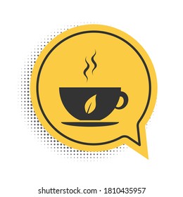 Black Cup of tea and leaf icon isolated on white background. Yellow speech bubble symbol. Vector.