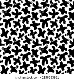 Black curved crosses or pluses seamless pattern. Trendy monochrome texture with symbols of kisses. Vector grunge bold brush strokes. Simple minimalistic graphic print. Minimalist geometrical texture