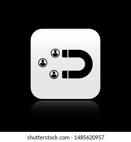 Black Customer attracting icon isolated on black background. Customer retention, support and service. Customer people attracting with magnet. Silver square button. Vector Illustration