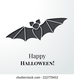 Black cutout bat. Halloween card or background