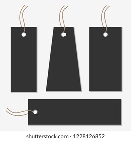 Black or dark gray gift tag collection in four different size and shape. Vintage present sticker. - Powered by Shutterstock - Get 15% off with code: PIKWIZARD15