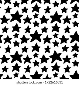 Black different ink stars isolated on white background. Seamless pattern. Hand drawn vector graphic illustration. Texture.