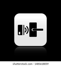Black Digital door lock with wireless technology for unlock icon isolated on black background. Door handle sign. Security smart home. Silver square button. Vector Illustration