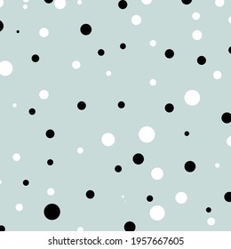 black dot and white dot on blue background. 