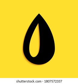 Black Drop icon isolated on yellow background. Long shadow style. Vector.