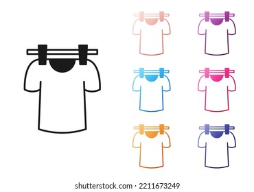 Black Drying clothes icon isolated on white background. Clean shirt. Wash clothes on a rope with clothespins. Clothing care and tidiness. Set icons colorful. Vector