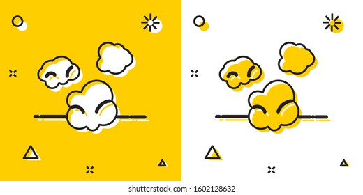 Black Dust icon isolated on yellow and white background. Random dynamic shapes. Vector Illustration