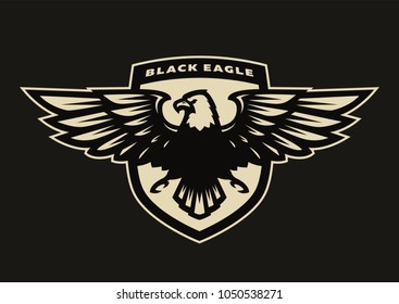 Black eagle symbol, emblem on a dark background.