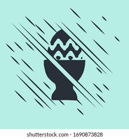 Black Easter egg on a stand icon isolated on green background. Happy Easter. Glitch style. Vector Illustration