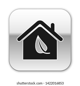 Black Eco friendly house icon isolated on white background. Eco house with leaf. Silver square button. Vector Illustration