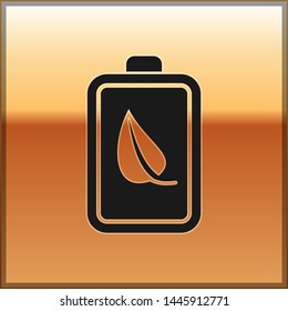 Black Eco nature leaf and battery icon isolated on gold background. Energy based on ecology saving concept. Vector Illustration