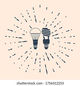 Black Economical LED illuminated lightbulb and fluorescent light bulb icon isolated on beige background. Save energy lamp. Abstract circle random dots. Vector Illustration