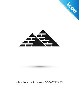 Black Egypt pyramids icon isolated on white background. Symbol of ancient Egypt.  Vector Illustration
