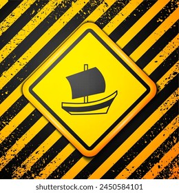 Black Egyptian ship icon isolated on yellow background. Egyptian papyrus boat. Warning sign. Vector