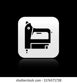 Black Electric construction stapler icon isolated on black background. Working tool. Silver square button. Vector Illustration