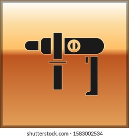 Black Electric drill machine icon isolated on gold background. Repair tool.  Vector Illustration