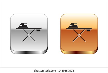 Black Electric iron and ironing board icon isolated on white background. Steam iron. Silver-gold square button. Vector Illustration