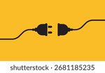 Black electric plug and socket disconnected with cable on yellow background, concept of energy, electricity, connection, power supply, and safety.