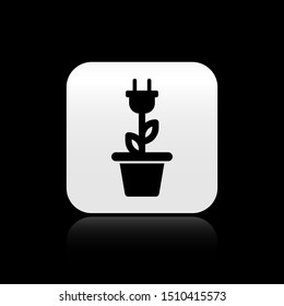 Black Electric saving plug in pot icon isolated on black background. Save energy electricity icon. Environmental protection icon. Bio energy. Silver square button. Vector Illustration
