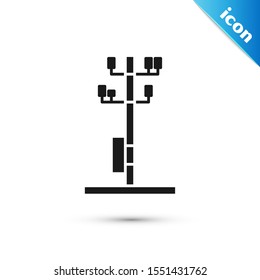 Black Electric tower used to support an overhead power line icon isolated on white background. High voltage power pole line.  Vector Illustration