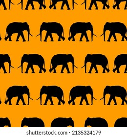 Black elephant silhouette isolated on orange vector seamless pattern design. Wildlife elefant with tusks and trunk.  Elephant silhouette endless pattern.