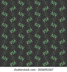 Black fabric with patches and green stitches. Upholstery texture.