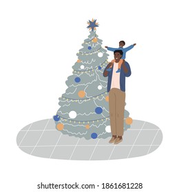 Black father and son standing and feeling excited after decorating Christmas tree