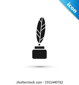 Black Feather and inkwell icon isolated on white background.  Vector Illustration