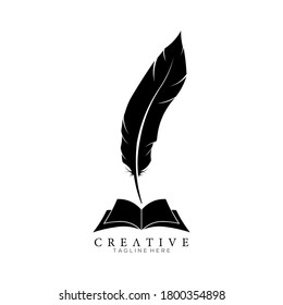Black Feather Pen above an Open Book