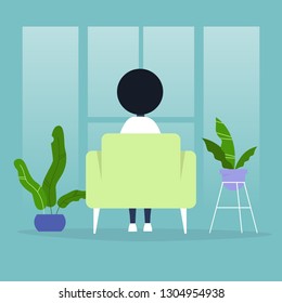 Black female character sitting in a chair in front of the window. Back view. Interior concept. Flat editable vector illustration, clip art