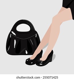 black female shoes and handbag