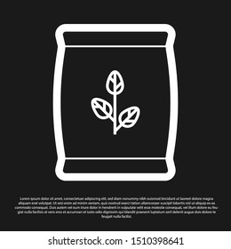 Black Fertilizer bag icon isolated on black background.  Vector Illustration