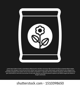 Black Fertilizer bag icon isolated on black background.  Vector Illustration
