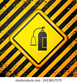 Black Fire extinguisher icon isolated on yellow background. Warning sign. Vector