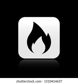Black Fire flame icon isolated on black background. Heat symbol. Silver square button. Vector Illustration