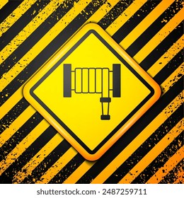 Black Fire hose reel icon isolated on yellow background. Warning sign. Vector