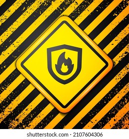 Black Fire protection shield icon isolated on yellow background. Insurance concept. Security, safety, protection, protect concept. Warning sign. Vector