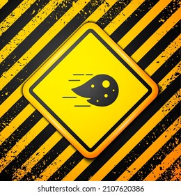 Black Fireball icon isolated on yellow background. Warning sign. Vector