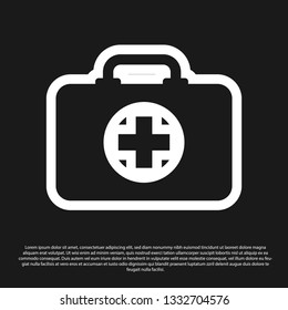 Black First aid kit icon isolated on black background. Medical box with cross. Medical equipment for emergency. Healthcare concept. Vector Illustration