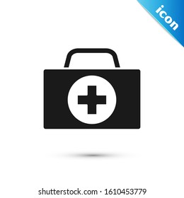 Black First aid kit icon isolated on white background. Medical box with cross. Medical equipment for emergency. Healthcare concept.  Vector Illustration