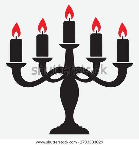 Black five-branched candelabra with lit red candle flames on a light gray background candlestick candle holder